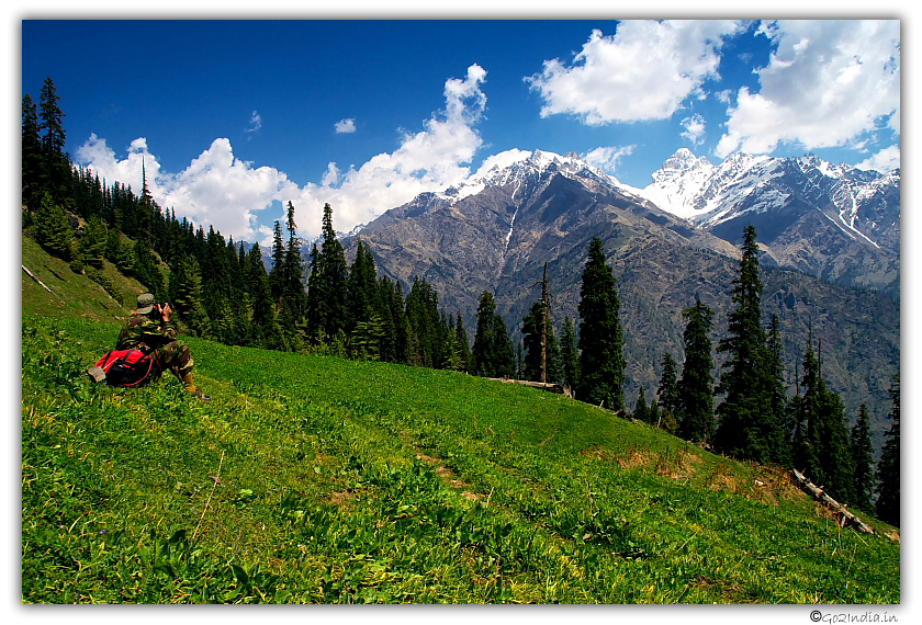 Vast green land and Snow capped peaks 