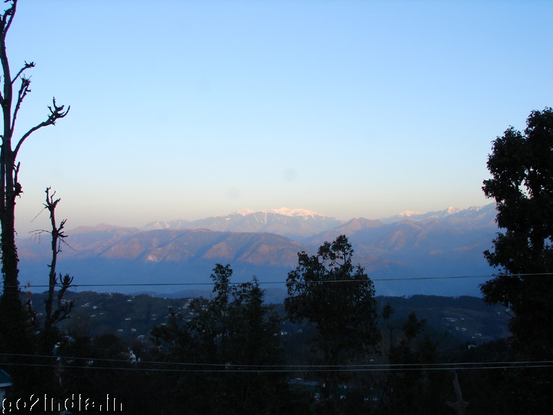 Morning view of snow capped mountains from Dalhousie