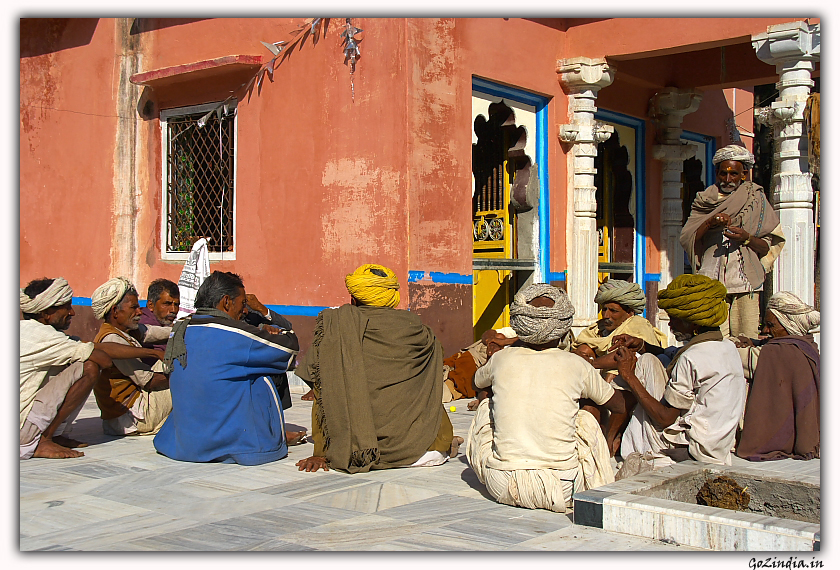 Village group near a temple in Rajasthan