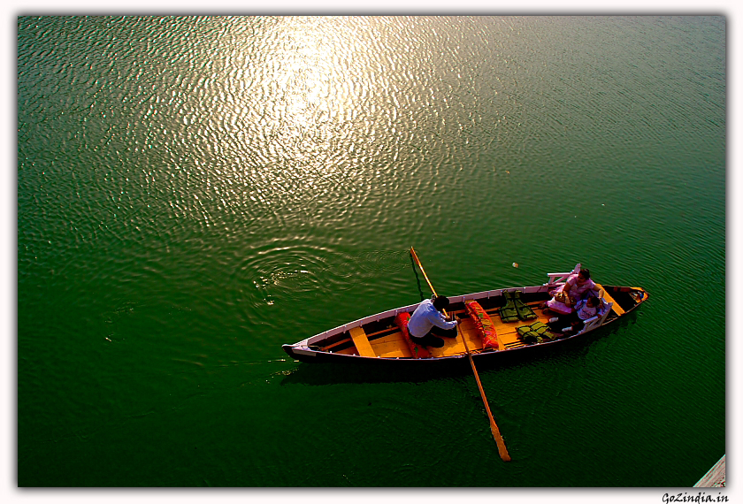 Boating in Bhimatal lake. One boat