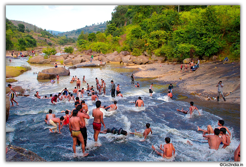 Enjoying the bath at flowing water stream at Chaparai 