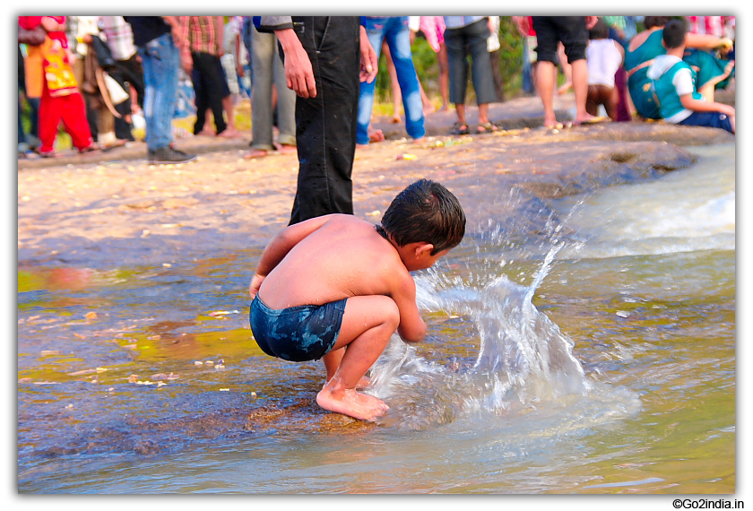 Kid at Chaparai water stream