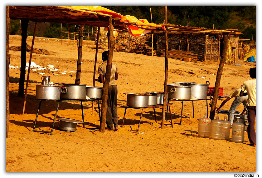 Food is arranged near the Huts by the side of river