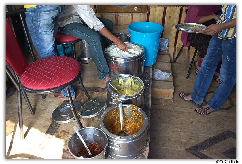 Serving Lunch inside the boat