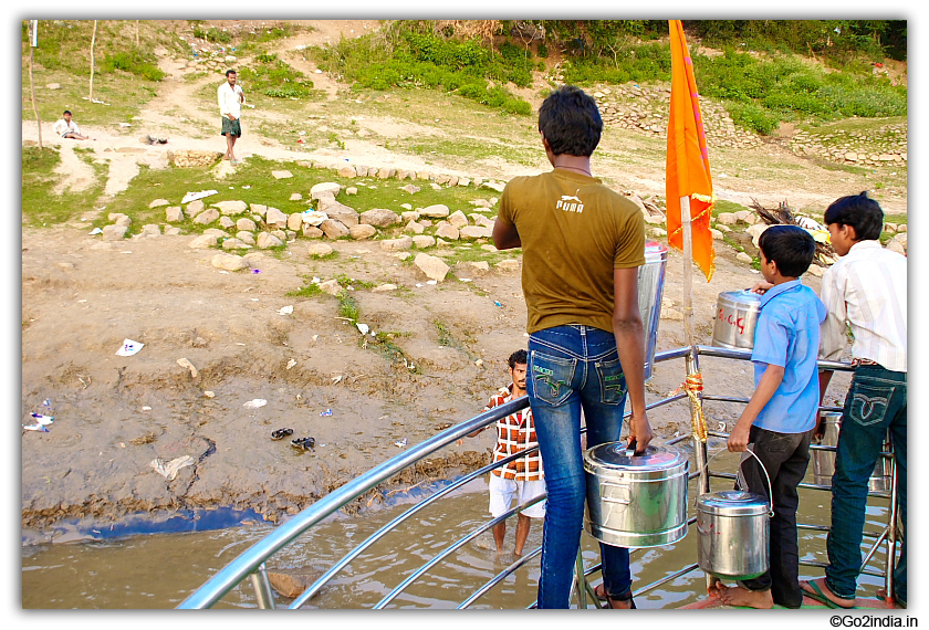 Unloading the food items on return journey