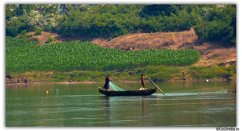 Fishing by boat in river Godavari