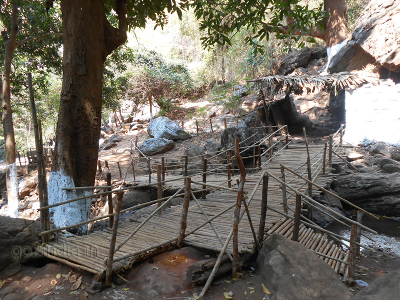 Bridge constructed by locals close to waterfall 