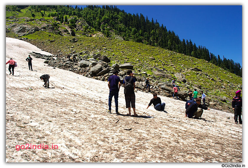 Tourist enjoying sliding on ice at Chandanwari
