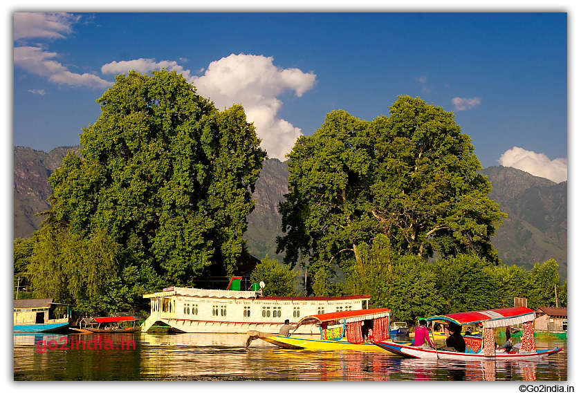 Houseboat and Shikara by the side of Dal Lake