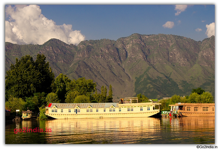 Houseboat and hills in Dal Lake