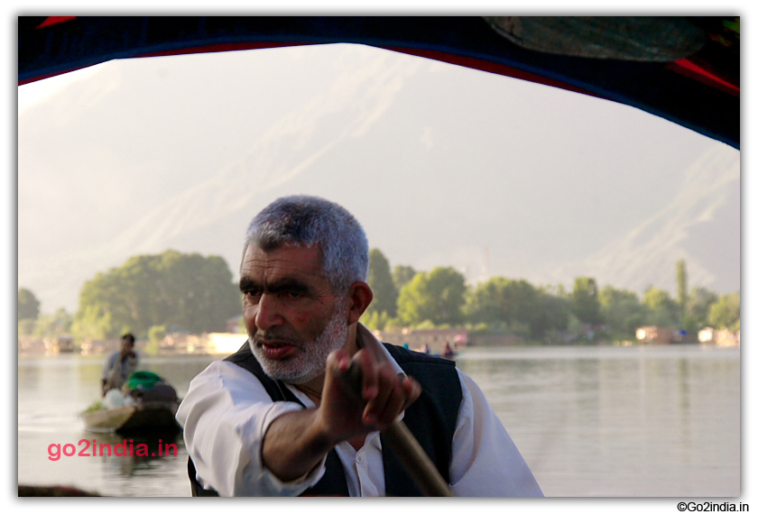 The boat man or Shikara owner in Dal Lake