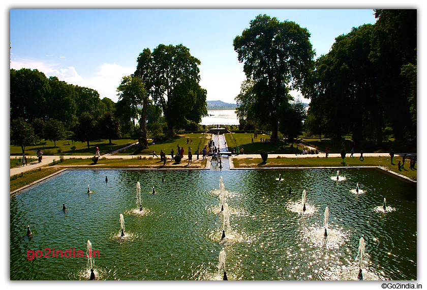 Small water fountains in ponds at Nishat Bagh garden