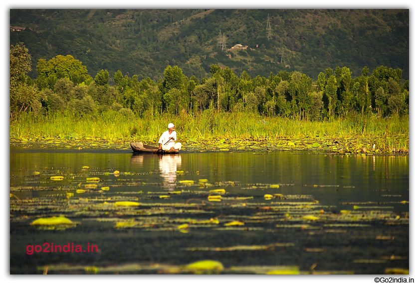 Old Man in his boat in Nagin Lake