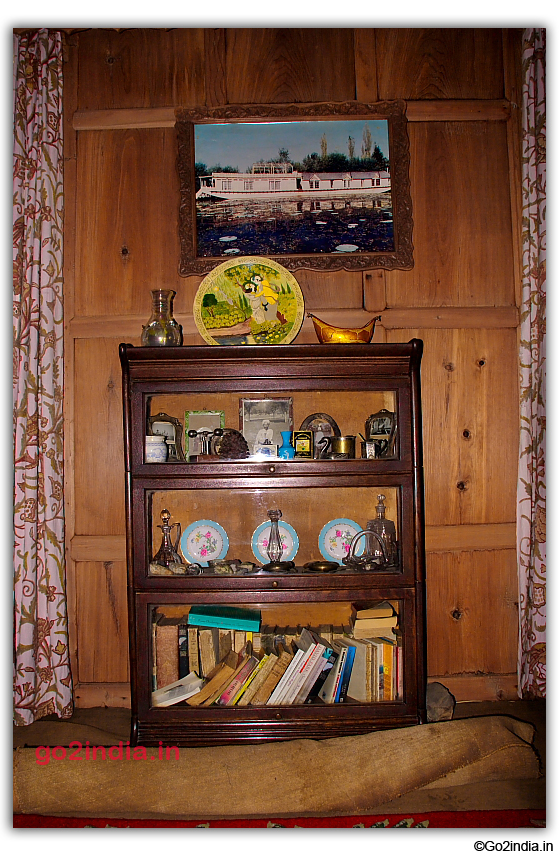 Old books and old items kept in the drawing room of Houseboat