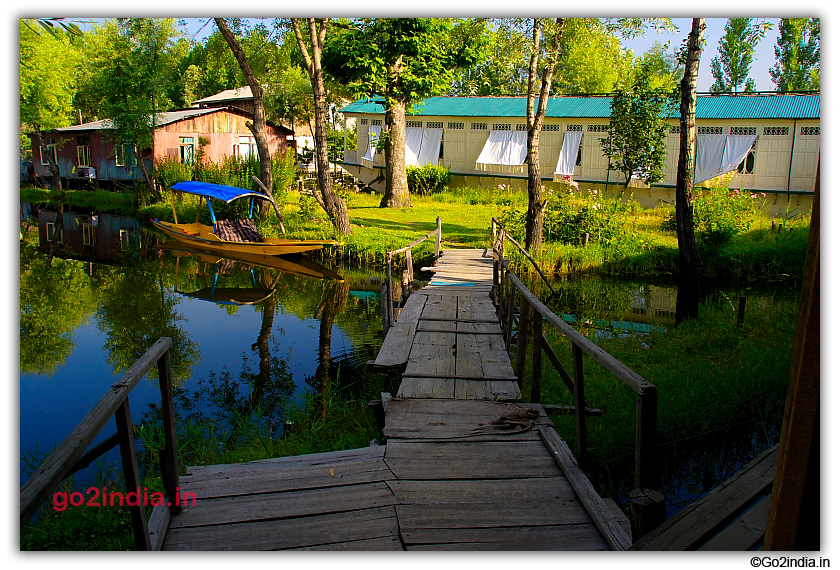 Small wooden bridge connecting Houseboat  to main land 