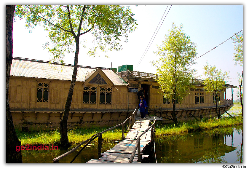 Wooden bridge and houseboat
