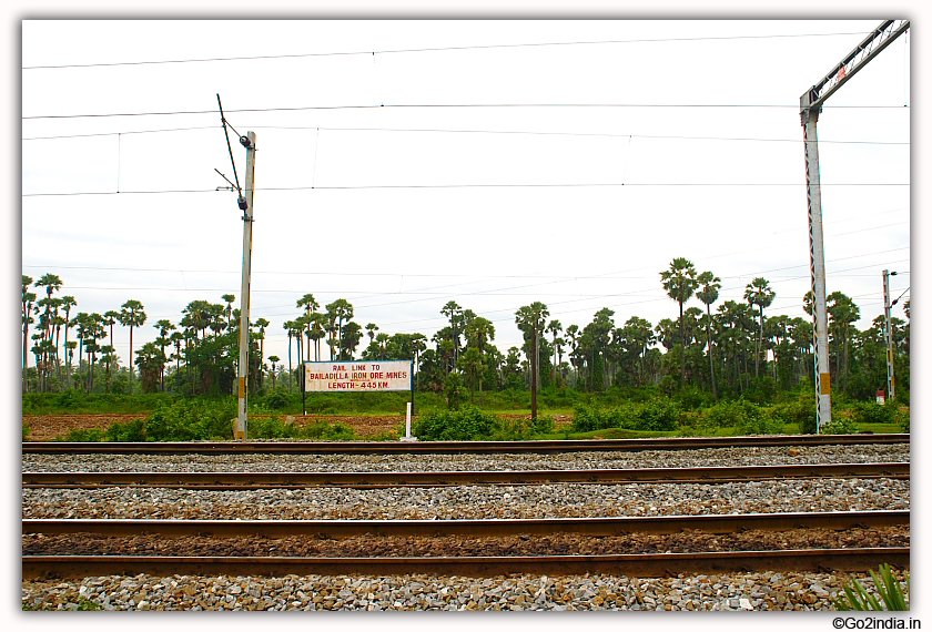 A board showing distance and starting of rail link to Kirnondul 