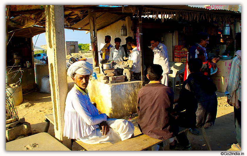 Rural Gujarat - Villagers assembled near a tea shop