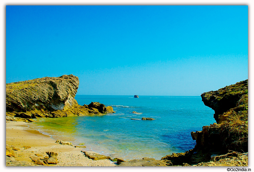 Sea between two rocks at Diu 