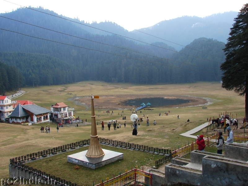 Saucer shaped ground surrounded by thick deodar trees