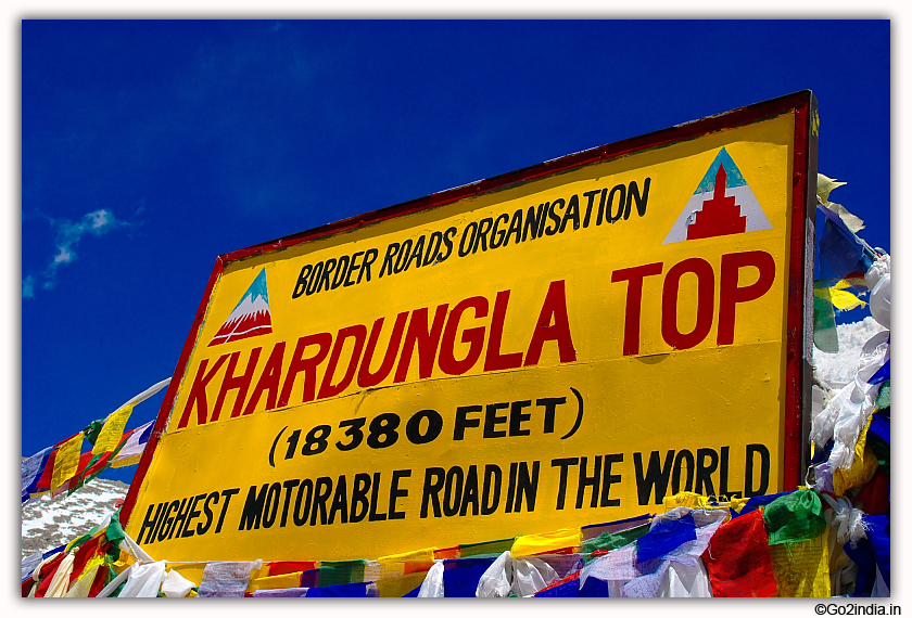 Board at Khardungla Top showing the height 